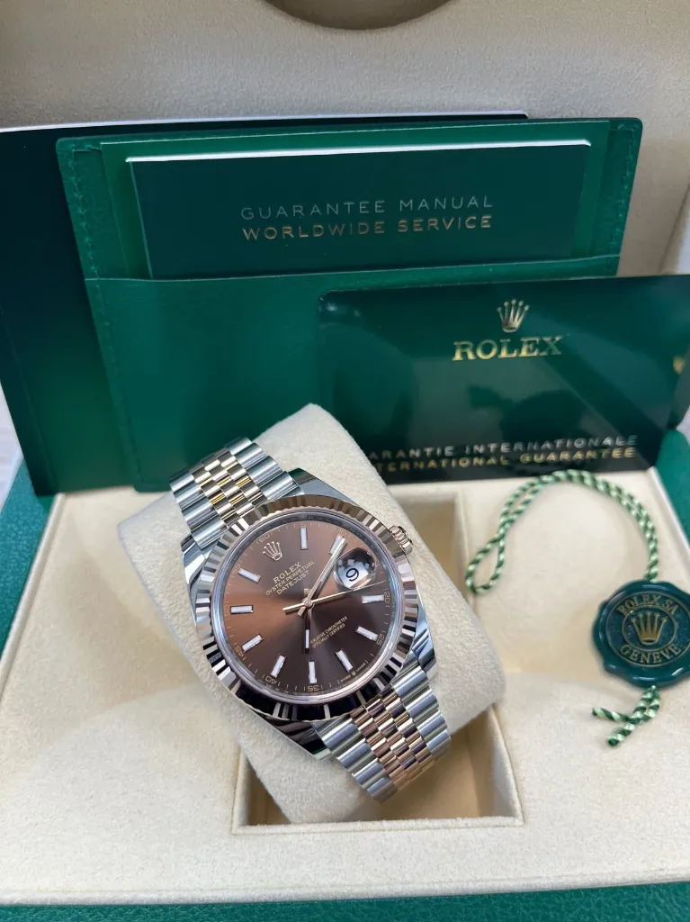 ROLEX DATE JUST ROSE GOLD CHOCOLATE DIAL JUBLIEE FLUTED BEZEL LEFT TO RIGHT DIAGONAL PIC FOR MASTER.webp