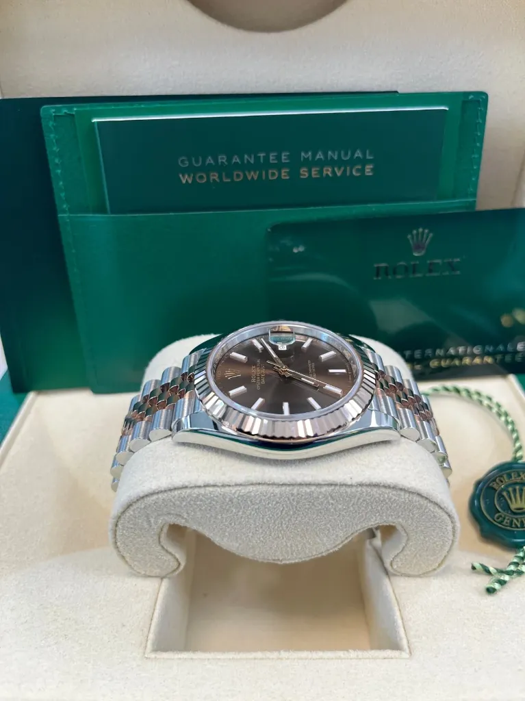 ROLEX DATE JUST ROSE GOLD CHOCOLATE DIAL JUBLIEE FLUTED BEZEL LEFT SIDE PIC FOR MASTER.webp